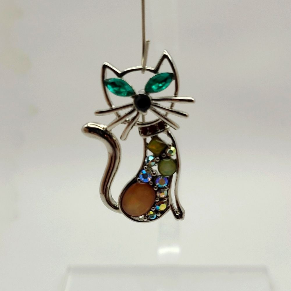 Vintage shiny multi-crystal silver tone cat brooch